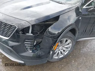 2020 Cadillac XT4 AWD Premium Luxury z VIN 1GYFZDR45LF049638, wystawiony jako IAAI lot #42216996 z przebiegiem 82 760 mil mil oraz . Historia ofert i sprzedaży dostępna na DreamBid. Obrazek 21.