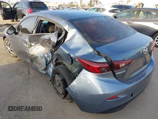 2015 Mazda 3 i Sport with VIN 3MZBM1U75FM145709, listed as a IAAI auction lot 41950471 with 124,407 mi miles and . Bid and sale history available at carsss.com. Image 3.