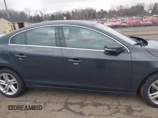 2015 Volvo S60 T5 Platinum with VIN YV1612TDXF1317203, listed as a IAAI auction lot 41715131 with 142,632 mi miles. Bid and sale history available at carsss.com. Image 13.