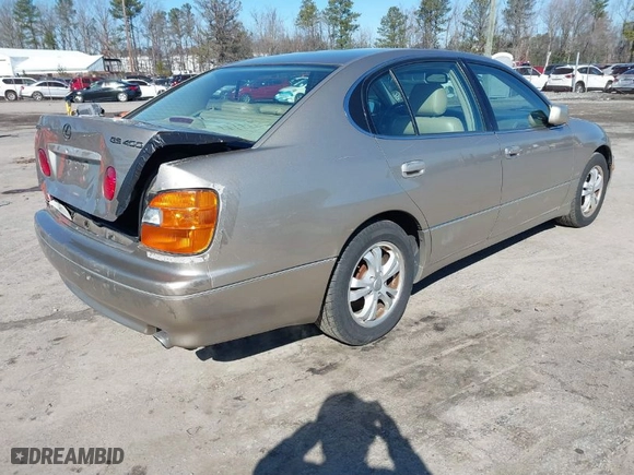 2000 Lexus GS 400 with VIN JT8BH68X9Y0023843, listed as a IAAI auction lot 41606902 with NaN miles. Bid and sale history available at carsss.com. Image 4.