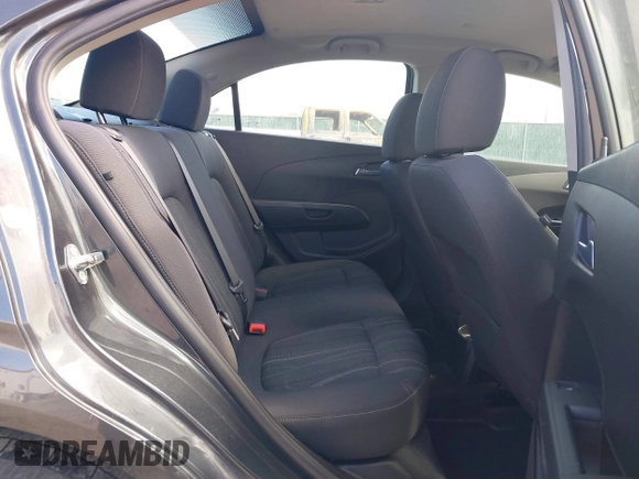 2016 Chevrolet Sonic LT z VIN 1G1JC5SH1G4185750, wystawiony jako IAAI lot #38799488 z przebiegiem 170 067 mil mil oraz . Historia ofert i sprzedaży dostępna na DreamBid. Obrazek 8.