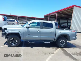 2019 Toyota Tacoma SR with VIN 3TMCZ5AN7KM213537, listed as a IAAI auction lot 42442068 with 39,969 mi miles and . Bid and sale history available at DreamBid. Image 15.