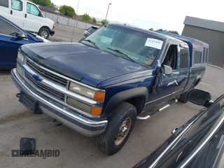 2000 Chevrolet Silverado 3500 z VIN 1GCHK33J1YF419504, wystawiony jako IAAI lot #42337616 z przebiegiem 169 037 mil mil oraz . Historia ofert i sprzedaży dostępna na DreamBid. Obrazek 2.