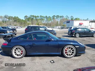 2004 Porsche 911 z VIN WP0AC29954S692825, wystawiony jako IAAI lot #41781530 z przebiegiem 28 942 mil mil oraz . Historia ofert i sprzedaży dostępna na DreamBid. Obrazek 14.