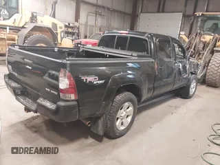 2009 Toyota Tacoma with VIN 3TMMU52N69M011591, listed as a IAAI auction lot 41941044 with 220,925 mi miles and . Bid and sale history available at DreamBid. Image 4.