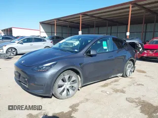 2023 Tesla Model Y Long Range with VIN 7SAYGAEE8PF667728, listed as a IAAI auction lot 41839771 with 32,654 mi miles and . Bid and sale history available at DreamBid. Image 17.