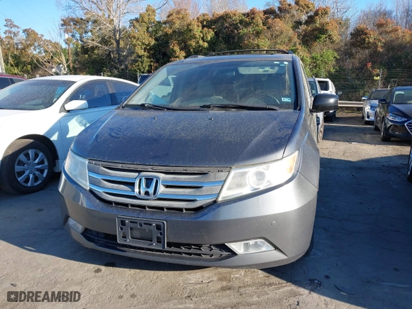 2013 Honda Odyssey Touring with VIN 5FNRL5H9XDB009973, listed as a IAAI auction lot 41904710 with 219,067 mi miles. Bid and sale history available at carsss.com. Image 12.