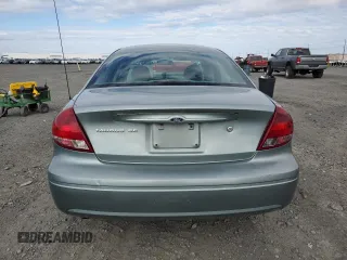2006 Ford Taurus SE z VIN 1FAFP53U76A109890, wystawiony jako Copart lot #57135575 z przebiegiem 160 750 mil mil oraz Szkoda całkowita • Salvage title. Historia ofert i sprzedaży dostępna na DreamBid. Obrazek 6.