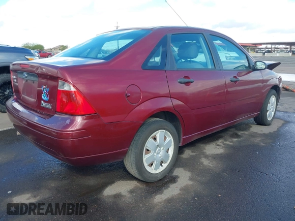 2007 Ford Focus S z VIN 1FAHP34NX7W114297, wystawiony jako IAAI lot #41774573 z przebiegiem 111 079 mil mil oraz . Historia ofert i sprzedaży dostępna na DreamBid. Obrazek 4.