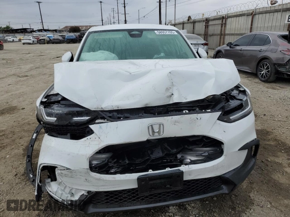 2023 Honda HR-V LX with VIN 3CZRZ1H37PM735335, listed as a Copart auction lot 58957705 with 21,203 mi miles and Salvage title. Bid and sale history available at DreamBid. Image 5.