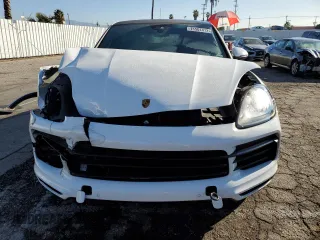 2021 Porsche Cayenne z VIN WP1BA2AY1MDA42695, wystawiony jako Copart lot #71507412 z przebiegiem 20 359 mil mil oraz . Historia ofert i sprzedaży dostępna na DreamBid. Obrazek 5.