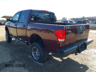 2007 Nissan Titan XE with VIN 1N6BA07A37N246586, listed as a IAAI auction lot 41393187 with 303,317 mi miles. Bid and sale history available at carsss.com. Image 3.