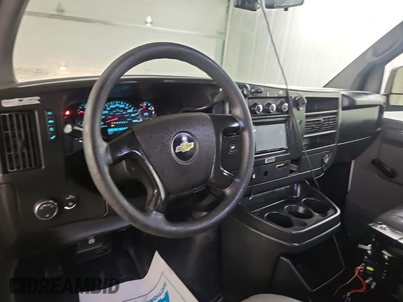 2014 Chevrolet Express Cargo z VIN 1GCSGAFXXE1162573, wystawiony jako IAAI lot #42547277 z przebiegiem 230 224 mil mil oraz . Historia ofert i sprzedaży dostępna na DreamBid. Obrazek 38.