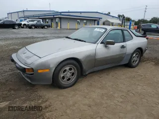 1987 Porsche 944 z VIN WP0AB0946HN474375, wystawiony jako Copart lot #75775914 z przebiegiem 176 306 mil mil oraz Czysty tytuł • Clean title. Historia ofert i sprzedaży dostępna na DreamBid. Obrazek 1.