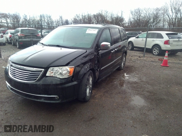 2015 Chrysler Town & Country Touring L with VIN 2C4RC1CG7FR539937, listed as a IAAI auction lot 41817807 with 158,400 mi miles and . Bid and sale history available at carsss.com. Image 2.