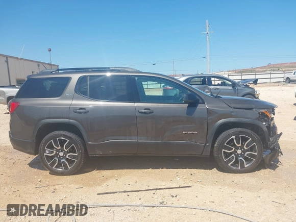 2019 GMC Acadia SLT with VIN 1GKKNMLSXKZ154992, listed as a IAAI auction lot 42452959 with 56,785 mi miles and . Bid and sale history available at DreamBid. Image 13.