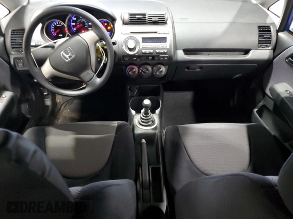 2007 Honda Fit with VIN JHMGD37447S041337, listed as a Copart auction lot 60352955 with 222,726 mi miles and Clean title. Bid and sale history available at DreamBid. Image 8.