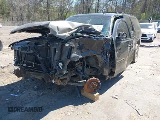 2010 Chevrolet Suburban LT with VIN 1GNUCJE0XAR144358, listed as a IAAI auction lot 41803071 with Not Provided miles and . Bid and sale history available at DreamBid. Image 6.