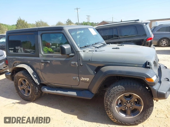 2020 Jeep Wrangler Sport S with VIN 1C4GJXAN5LW146068, listed as a IAAI auction lot 42071619 with 51,238 mi miles and . Bid and sale history available at DreamBid. Image 13.