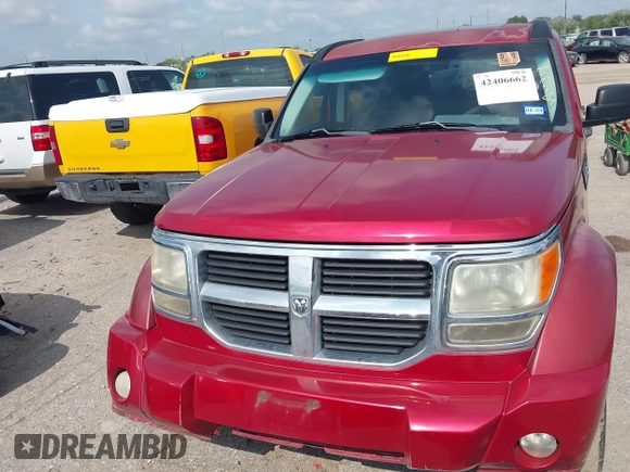 2008 Dodge Nitro SXT z VIN 1D8GT28K18W259419, wystawiony jako IAAI lot #42406662 z przebiegiem 197 382 mil mil oraz . Historia ofert i sprzedaży dostępna na DreamBid. Obrazek 6.