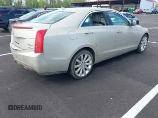 2014 Cadillac ATS Luxury AWD with VIN 1G6AH5RX6E0155382, listed as a IAAI auction lot 42025727 with 104,862 mi miles and . Bid and sale history available at carsss.com. Image 4.