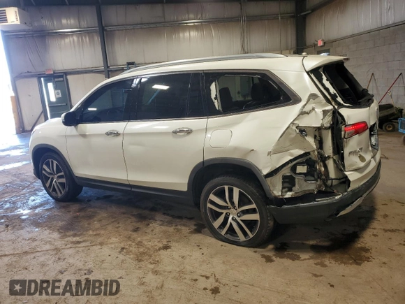 2017 Honda Pilot Elite with VIN 5FNYF6H08HB005758, listed as a Copart auction lot 53655725 with 124,218 mi miles and Salvage Title. Bid and sale history available at DreamBid. Image 2.