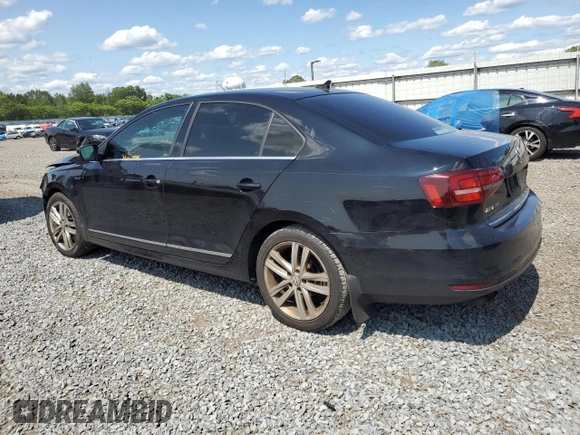 2017 Volkswagen Jetta SEL z VIN 3VWL17AJ6HM404789, wystawiony jako Copart lot #59029645 z przebiegiem 129 788 mil mil oraz Szkoda całkowita • Salvage title. Historia ofert i sprzedaży dostępna na DreamBid. Obrazek 2.