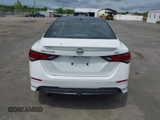 2020 Nissan Sentra SR z VIN 3N1AB8DV6LY228861, wystawiony jako IAAI lot #42225193 z przebiegiem 91 399 mil mil oraz . Historia ofert i sprzedaży dostępna na DreamBid. Obrazek 16.