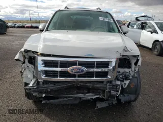 2010 Ford Escape Limited z VIN 1FMCU0EG8AKB93264, wystawiony jako Copart lot #48755805 z przebiegiem 69 141 mil mil oraz Szkoda całkowita • Salvage title. Historia ofert i sprzedaży dostępna na DreamBid. Obrazek 5.