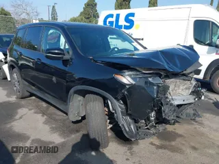 2021 Honda Passport EX-L with VIN 5FNYF7H5XMB013923, listed as a IAAI auction lot 41669295 with 42,969 mi miles. Bid and sale history available at carsss.com. Image 1.