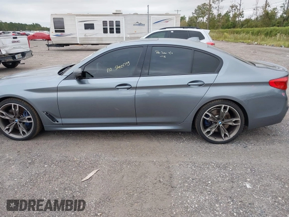 2019 BMW 5 Series M550i xDrive with VIN WBAJB9C57KB289439, listed as a IAAI auction lot 40634389 with 85,992 mi miles and . Bid and sale history available at DreamBid. Image 15.