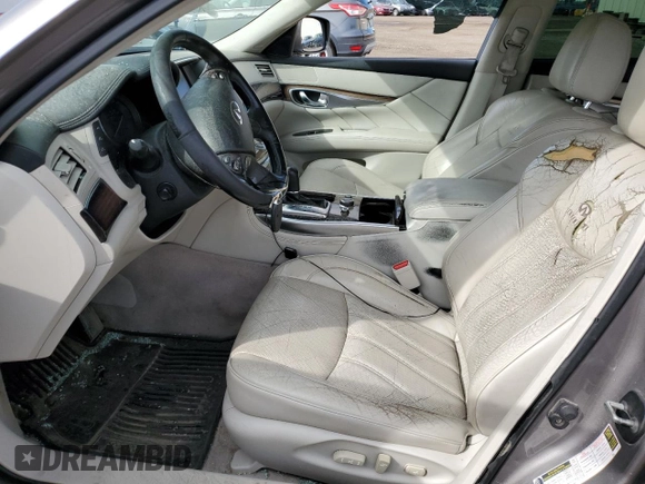 2011 Infiniti M with VIN JN1BY1ARXBM370844, listed as a Copart auction lot 62425515 with 277,315 mi miles and Salvage title. Bid and sale history available at DreamBid. Image 7.