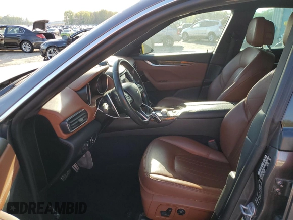 2017 Maserati Levante S z VIN ZN661YUS1HX225966, wystawiony jako Copart lot #52089285 z przebiegiem 118 690 mil mil oraz Szkoda całkowita • Salvage title. Historia ofert i sprzedaży dostępna na DreamBid. Obrazek 7.