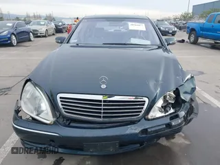 2001 Mercedes-Benz S with VIN WDBNG75J01A152091, listed as a IAAI auction lot 38561077 with 84,669 mi miles. Bid and sale history available at carsss.com. Image 12.