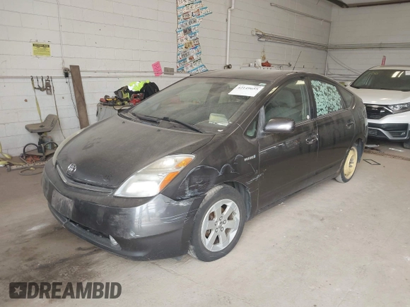 2007 Toyota Prius z VIN JTDKB20UX73266247, wystawiony jako IAAI lot #42149655 z przebiegiem 190 979 mil mil oraz . Historia ofert i sprzedaży dostępna na DreamBid. Obrazek 6.
