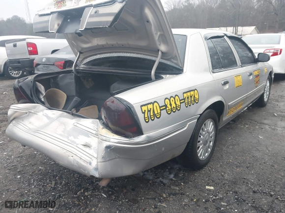 2007 Mercury Grand Marquis LS with VIN 2MEFM75V77X637957, listed as a IAAI auction lot 41520607 with 168,313 mi miles. Bid and sale history available at carsss.com. Image 4.