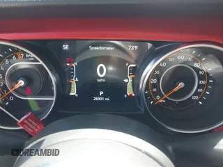 2023 Jeep Gladiator Rubicon z VIN 1C6JJTBG3PL531982, wystawiony jako IAAI lot #42211139 z przebiegiem 28 301 mil mil oraz . Historia ofert i sprzedaży dostępna na DreamBid. Obrazek 7.