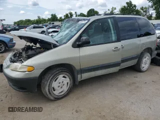 1999 Dodge Caravan with VIN 1B4GP45G7XB529075, listed as a Copart auction lot 60448215 with Not provided miles and Salvage title. Bid and sale history available at DreamBid. Image 1.