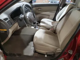 2009 Kia Spectra EX with VIN KNAFE222495664515, listed as a Copart auction lot 77566074 with 151,615 mi miles and Clean Title. Bid and sale history available at carsss.com. Image 7.