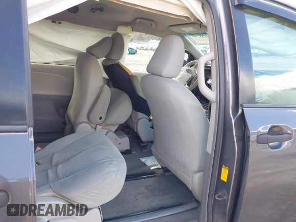 2014 Toyota Sienna L with VIN 5TDZK3DC4ES407928, listed as a IAAI auction lot 41887349 with 208,289 mi miles. Bid and sale history available at carsss.com. Image 8.