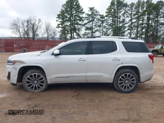 2021 GMC Acadia Denali with VIN 1GKKNPLS1MZ139821, listed as a IAAI auction lot 41455357 with 61,265 mi miles and . Bid and sale history available at carsss.com. Image 14.