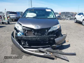 2015 Toyota Sienna XLE with VIN 5TDYK3DC4FS634937, listed as a IAAI auction lot 41869781 with 65,561 mi miles and . Bid and sale history available at carsss.com. Image 12.