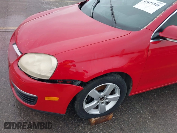 2009 Volkswagen Jetta Sedan SE with VIN 3VWRM71K99M123288, listed as a IAAI auction lot 41892948 with 345,159 mi miles. Bid and sale history available at carsss.com. Image 18.