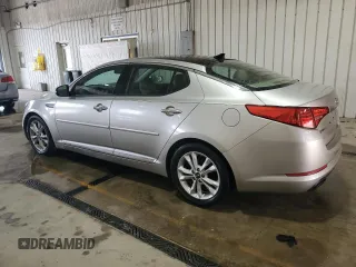 2011 Kia Optima EX z VIN KNAGN4A73B5168902, wystawiony jako Copart lot #59569365 z przebiegiem 160 297 mil mil oraz Szkoda całkowita • Salvage title. Historia ofert i sprzedaży dostępna na DreamBid. Obrazek 2.