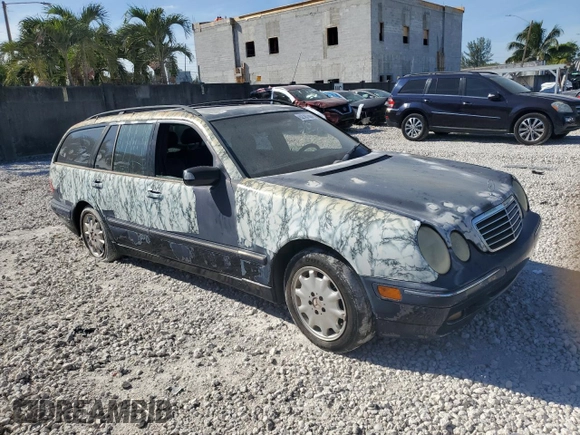 2001 Mercedes-Benz E-Class AWD with VIN WDBJH82J91X053532, listed as a Copart auction lot 82387664 with 116,737 mi miles and Salvage Title. Bid and sale history available at carsss.com. Image 4.