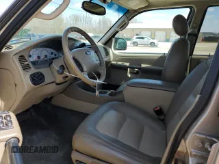 2005 Ford Explorer Sport Trac XLS with VIN 1FMDU77K35UA00852, listed as a Copart auction lot 52209715 with 247,583 mi miles and Salvage title. Bid and sale history available at DreamBid. Image 7.