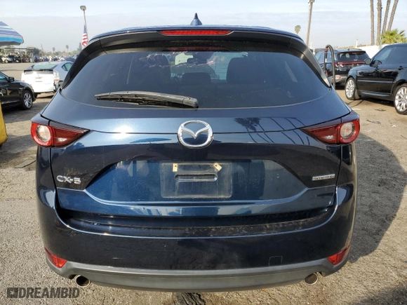 2020 Mazda CX-5 Touring with VIN JM3KFACM4L0860328, listed as a Copart auction lot 43459595 with NaN miles and Salvage Title. Bid and sale history available at carsss.com. Image 6.