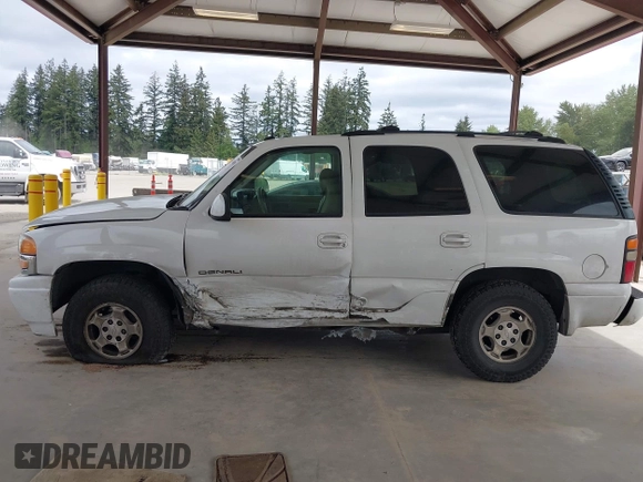 2004 GMC Yukon Denali z VIN 1GKEK63U84J148225, wystawiony jako IAAI lot #42218451 z przebiegiem 296 149 mil mil oraz . Historia ofert i sprzedaży dostępna na DreamBid. Obrazek 14.