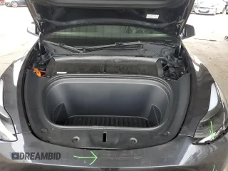 2025 Tesla Model Y Long Range with VIN 7SAYGDED2SF234388, listed as a Copart auction lot 47250965 with 3,702 mi miles and Salvage Title. Bid and sale history available at DreamBid. Image 13.
