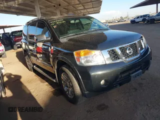 2015 Nissan Armada Platinum z VIN 5N1BA0NEXFN603295, wystawiony jako IAAI lot #41040066 z przebiegiem 112 162 mil mil oraz . Historia ofert i sprzedaży dostępna na DreamBid. Obrazek 1.